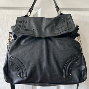 Mossimo black bag . New.Top handle. Crossbody. Measures approx 12""x15"Wx4 1/2.